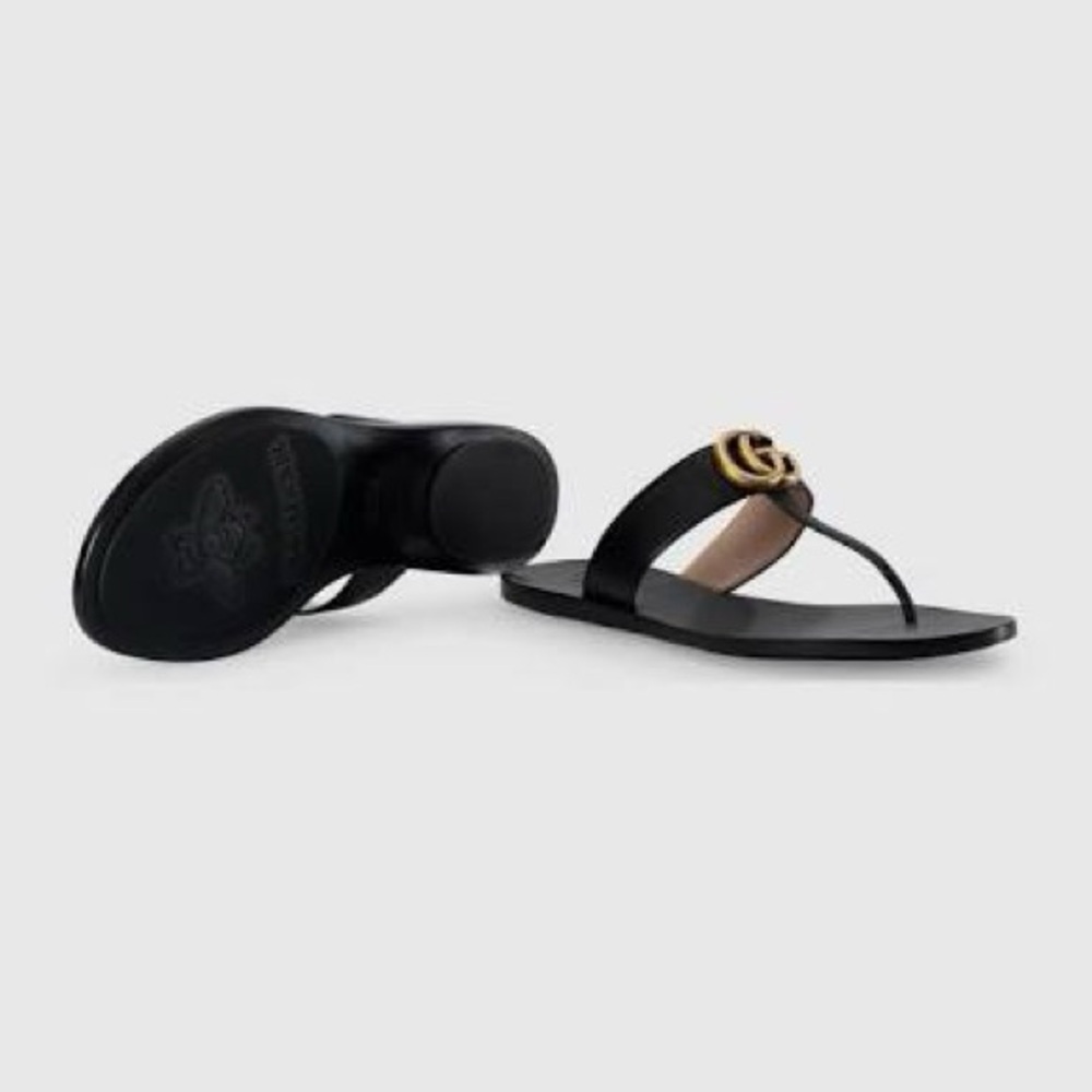 Gucci Black Flip Flops with Gold Emblem